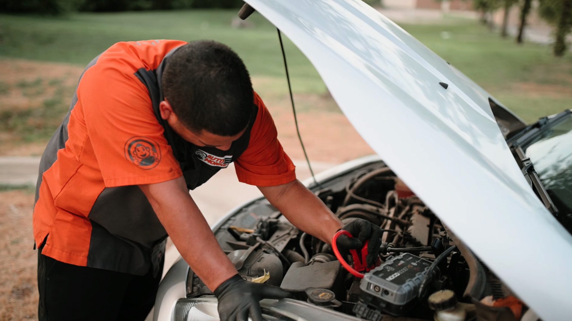 Auto Monkey mobile mechanic technician performing a battery check service